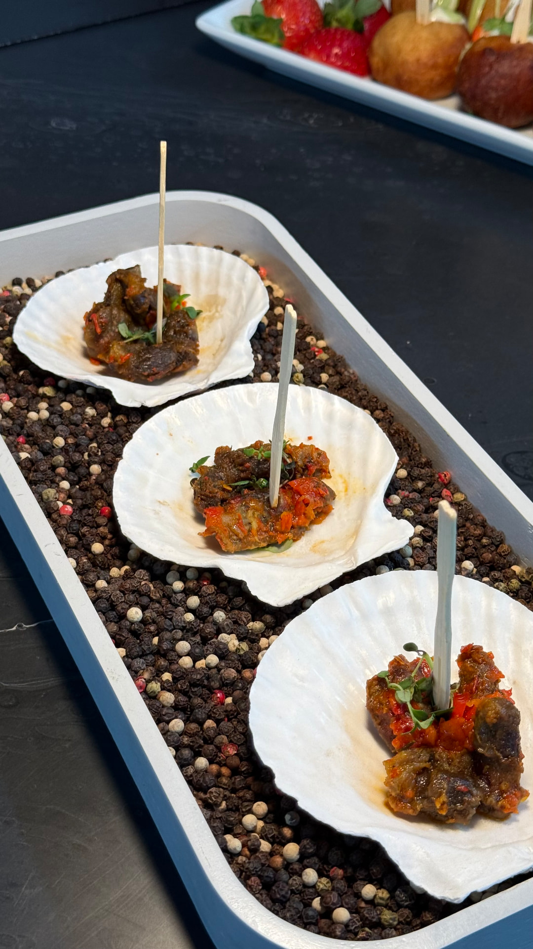 Peppered canapé bites presented in shells