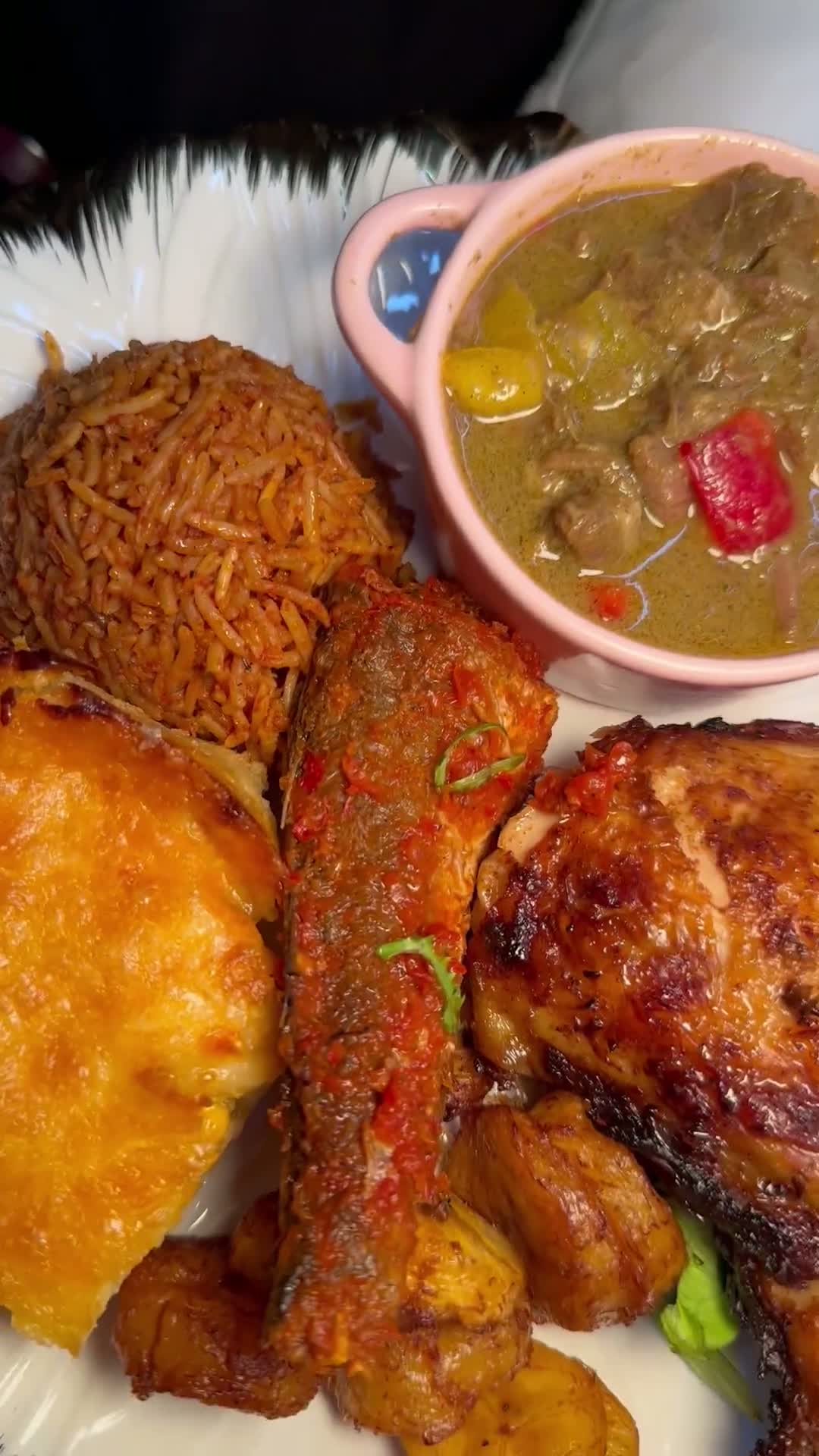 Nigerian party jollof and stews prepared by Adena's Catering