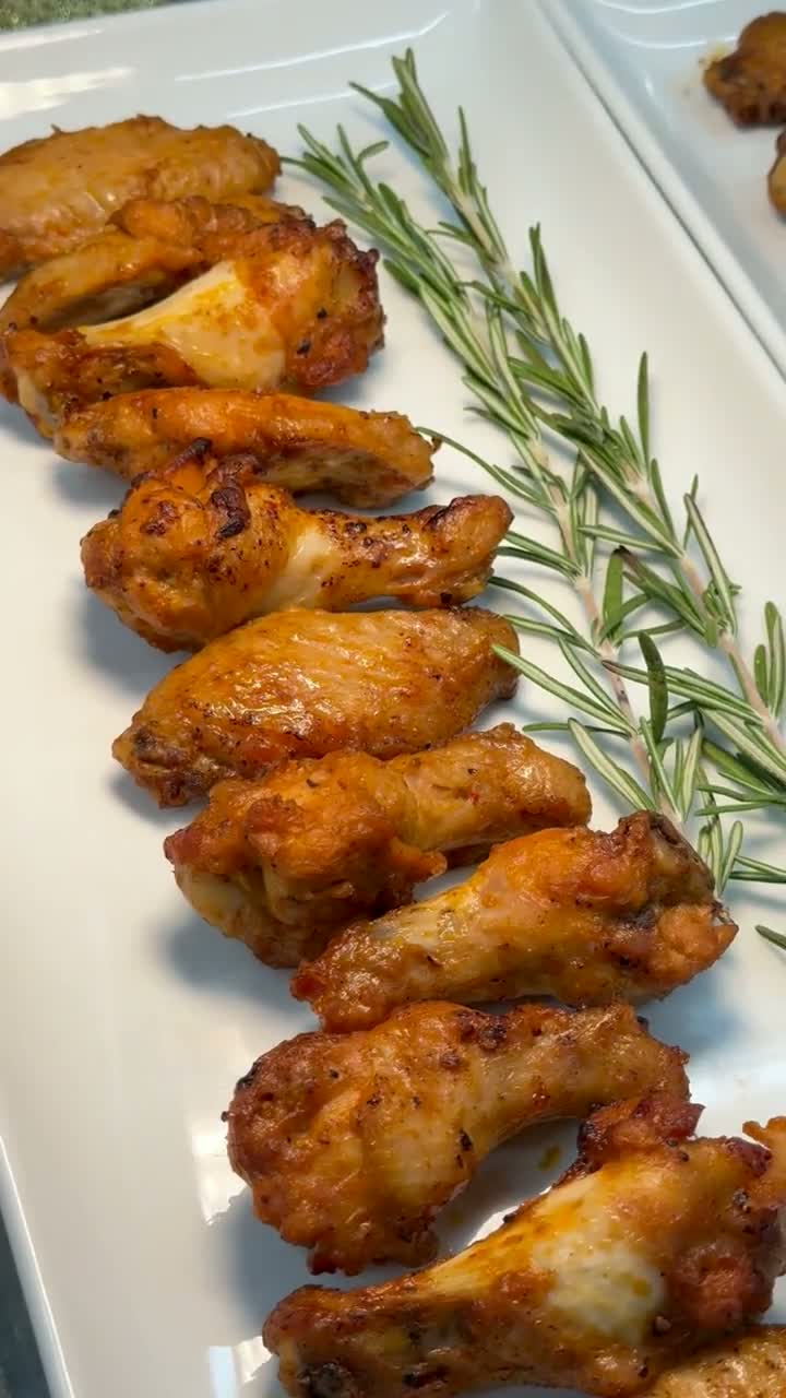 Chicken wings arranged with rosemary — catering video